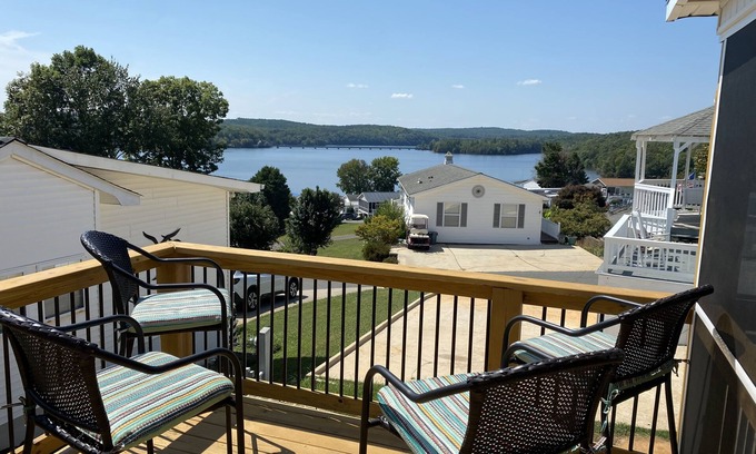 New London House | Phoenix Tiny House at Badin Shores Resort, lake view, porch, pool, beach, marina