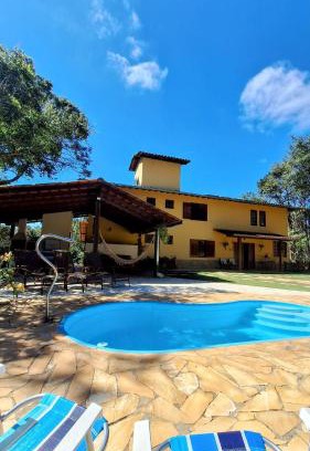 Sao Sebastiao das Aguas Claras House | PISCINA AQUECIDA, 5 SUÍTES, trilha privativa até o riacho, Wi-fi, estacionamento, ampla área externa cercada de natureza exuberante - 200m do vilarejo