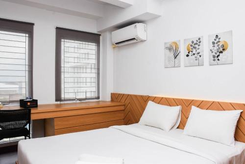 Bekasi Apartment | Pleasant Studio Patraland Urbano Apartment near Station By Travelio