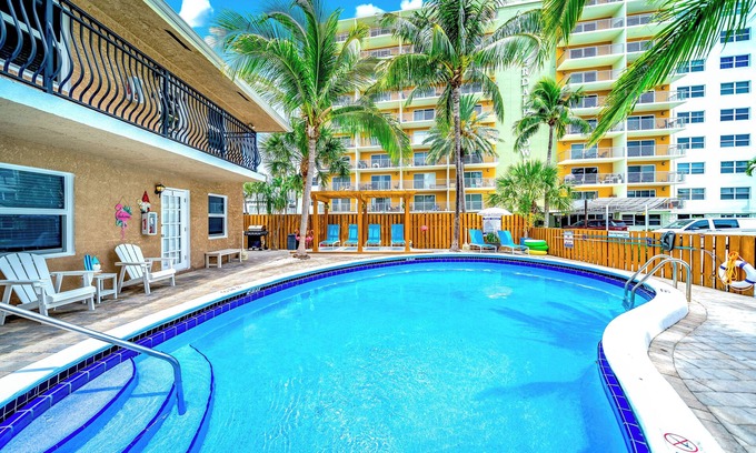 Coral Ridge Apartment | Pool! Coastal Beach Getaway! Walk 2 Beach+Shops!