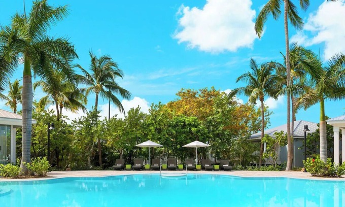 New Town Hotel | Poolside Paradise l Fire Pits, Lawn Games, Live Music & Endless Fun