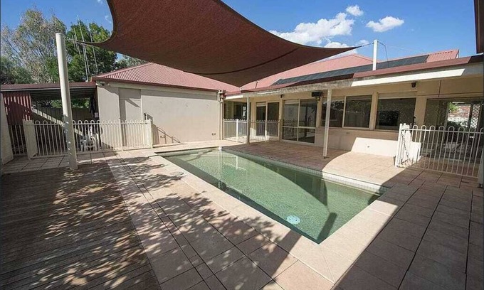 Swan Hill House | Poolside Retreat with Golf Views
