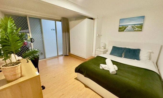 Macgregor Apartment | Prime1BR Near Transport & Retail