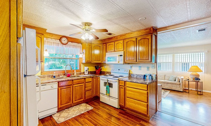 Ellenton House | Private community home with on-site pool, screened patio, central AC, & W/D