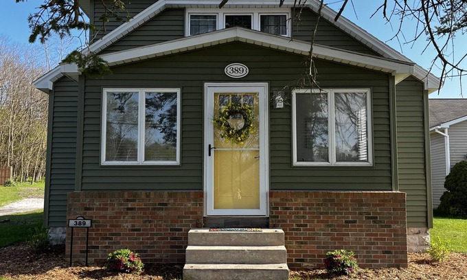 Manistee House | Private Hot Tub, Outdoor TV, near Downtown & Lake Michigan Beaches!