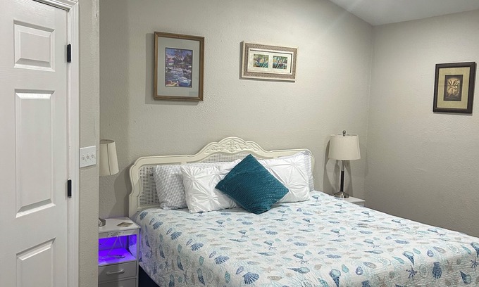 Apalachicola House | Private King Room with outdoor entrance, deck, and private bathroom.