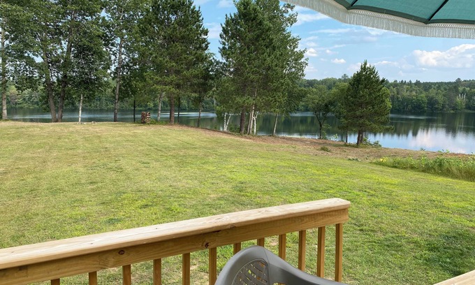 Crystal Falls House | Private Lake House on 16 +/- wooded acres, 80 + acre lake, 55 foot deep!