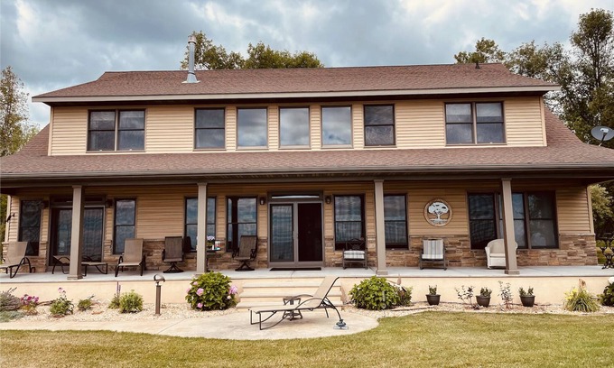 Ingalls House | Private lakefront home with 1,200 feet of sandy beach. A year-round retreat.