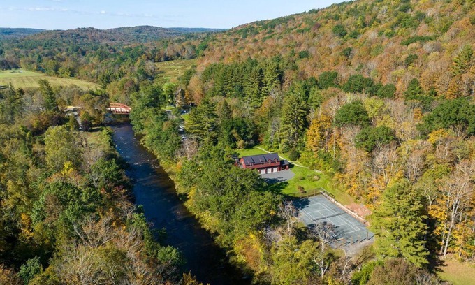 Cummington House | Private river-front home with tennis court and hot tub in the Berkshire hills!