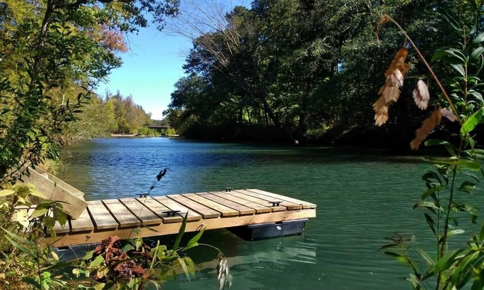 Caddo Gap RV Rental | Private River Tent Camping with Kayaks & Outdoor Bathhouse! Pet friendly!