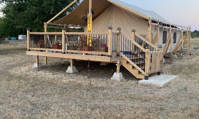 Miller Grove RV Rental | Private safari tent with ac/heat, Wifi and an exceptional view off a large deck.
