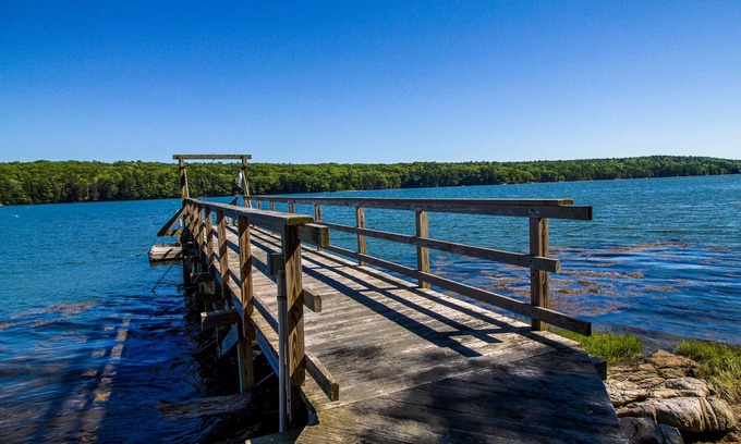 Mac Mahan Cabin | Private waterfront home with large deck & deep water dock