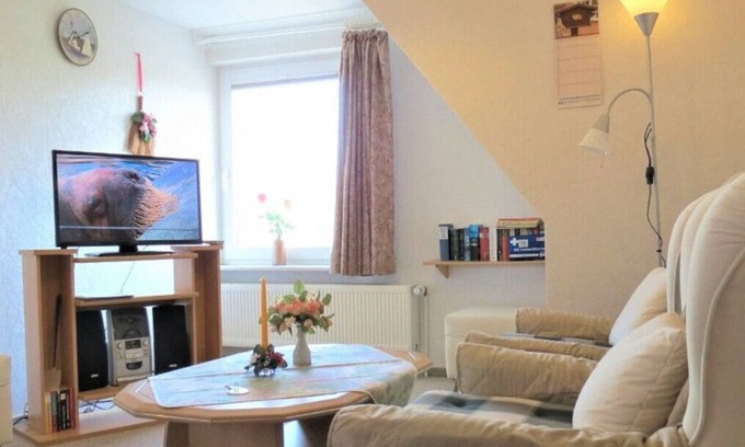 Busumer Deichhausen Apartment | Puls-ferienwohnungen 300m vom Badestrand. Der Erholungsort ist Kurtaxe Frei