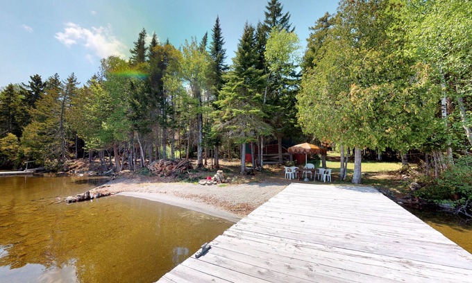 Northeast Somerset Cabin | Quiet Dog-Friendly Waterfront Getaway with Private Beach, Dock, & Firepit