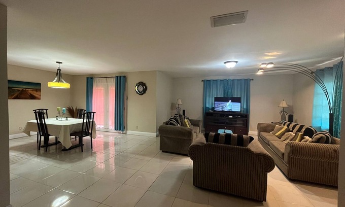 Bahamas Terrace House | Quiet getaway near Xanadu Beach, Freeport with Central Air, WiFi & free parking.