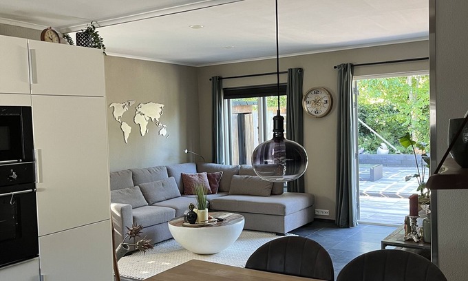 Bruinisse House | Quietly located corner house in Zeeland with generous south-facing terrace