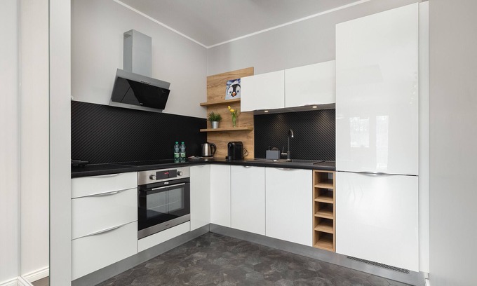 West Pomeranian Voivodeship Apartment | Raginisa Black Modern Apartment