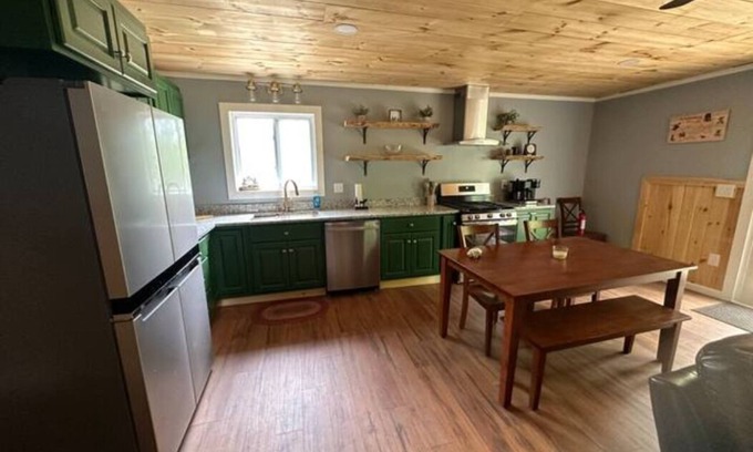 Dexter Cabin | Rail Trail Retreat! Recently remodeled cozy home on Snowmobile/ATV Trail!