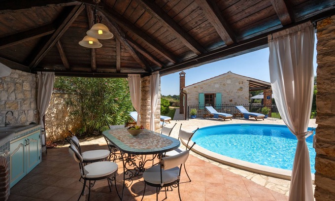 Mofardini Villa | Recharge your soul at this romantic stone villa with pool, garden & sunset view