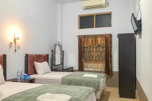 Benteng Hotel | RedDoorz Syariah At Hotel Baruga Bonerate Selayar