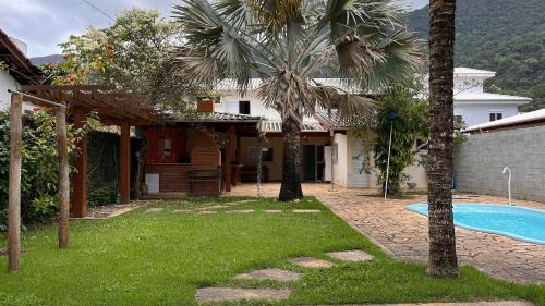 Centro House | Refúgio a poucos passos da Praia de Guaecá