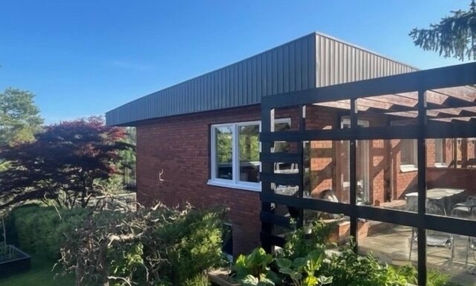 Saltsjobaden House | Refurbished 60s villa w astonishing tree top view, evening sun, close to the sea