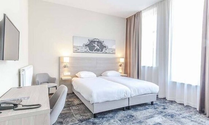 Leeuwarden Hotel | Relax in Historic Luxury with Garden Dining, Near Galleries and Oldehove