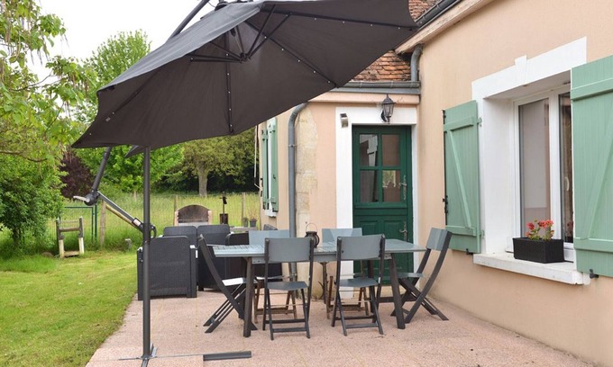 Saint-Calez-en-Saosnois Cottage | Renovated 19th-Century Cottage with Terrace, Trampoline, Spa, & Games in Quiet Hamlet