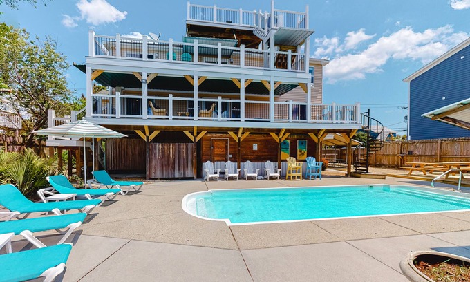 Sandbridge House | Renovated canal home with private pool, dock, roof deck, ocean/bay view, wet bar