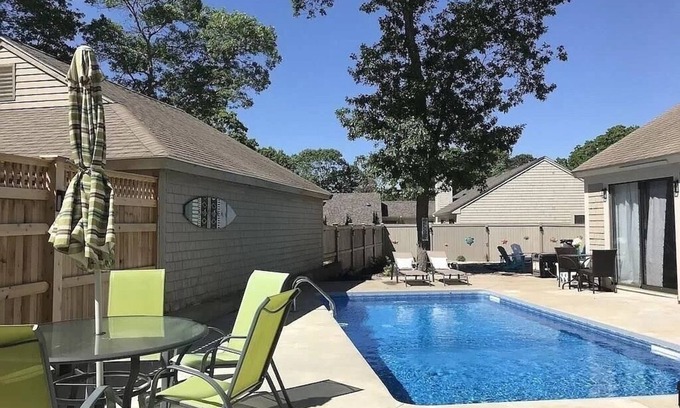 Mews Village House | Renovated Home with heated pool near the beach! Fenced in yard +pet friendly