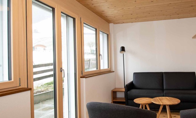 Adelboden Apartment | right on the ski hill, a cozy 2 bedroom with living room apartment fits 6 people