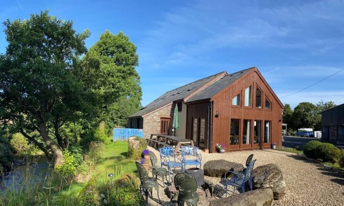 Brecon House | Riverbank Barn Conversion (dated 1770) Offers Luxury Accommodation 15 People
