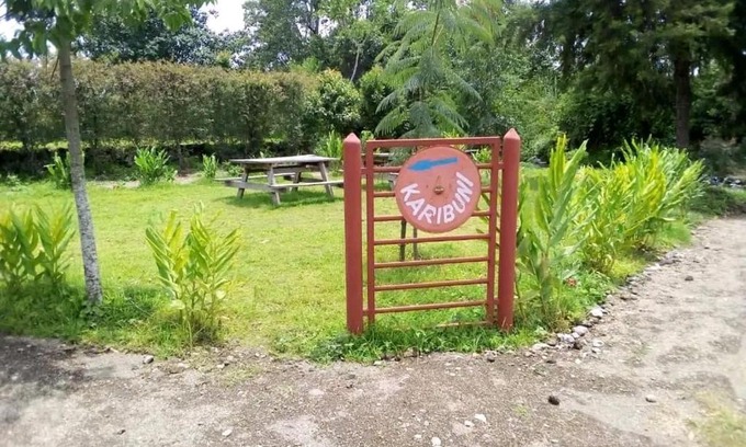 Rungwe Apartment | Riverbanks fish farm&Campsite
