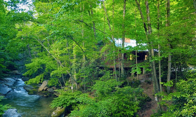 Millers Creek Cabin | Riverfront Log Cabin w/Private Waterfall, Firepit & Panoramic Deck
