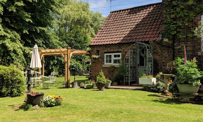 Boston Cottage | Riverside cottage in a beautiful garden in Lincolnshire.