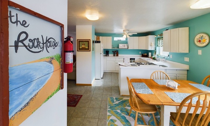 Munising House | Rock House-Downtown Munising with Private Patio, Garage, Fire-pit & BBQ Grill