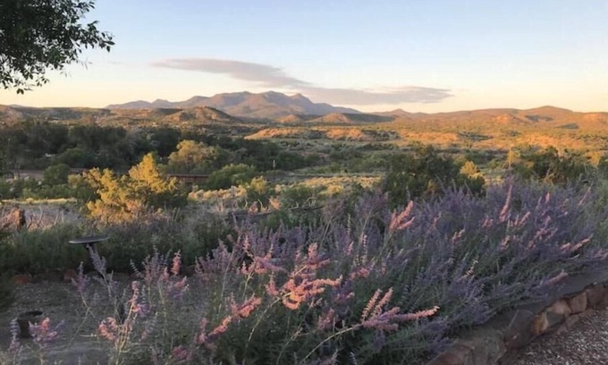 Cerrillos House | Romantic Adobe Casita, Hot tub, Kitchen, Woodstove, astounding views, historic.