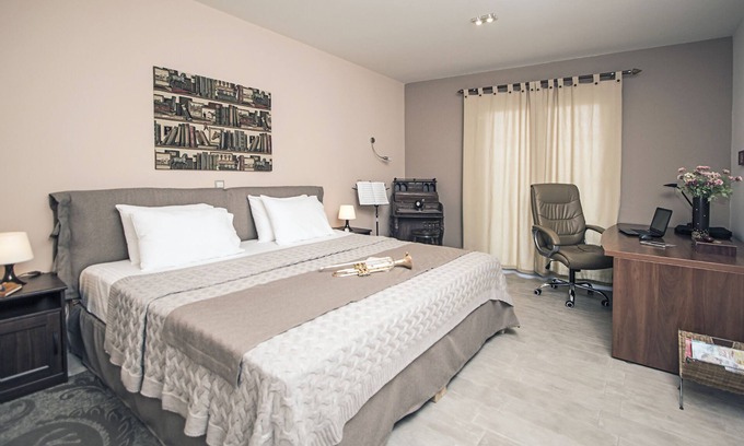 Gouvia Villa | Roof Garden Villa is located on the hill top near Gouvia with beautiful views.