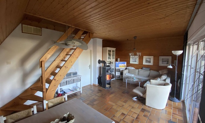 Neufeld House | Roof house with 70m² on two levels with a garden, 150m to the dike