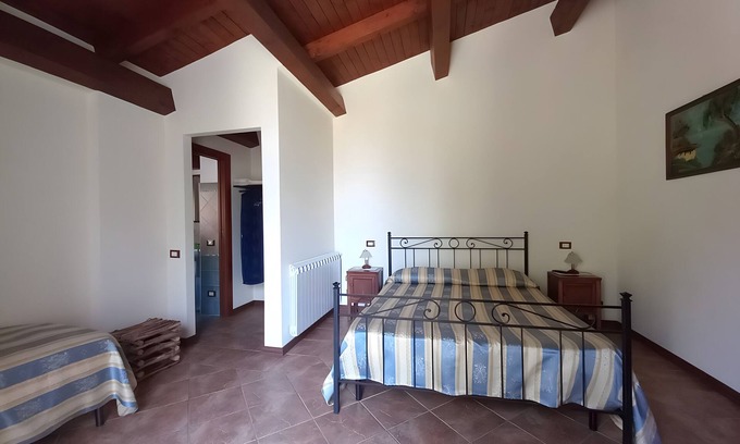 Patti Apartment | Room 'Lipari' with terrace, shared garden and air conditioning