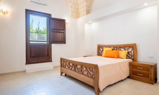Pulsano Apartment | Room 'Piano Terra' with Private Garden, Wi-Fi and Air Conditioning