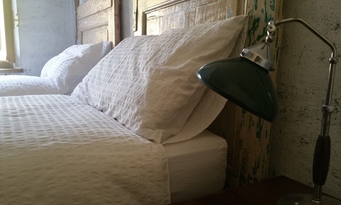 Passerano Marmorito House | Room with bathroom and hallway, 2 beds