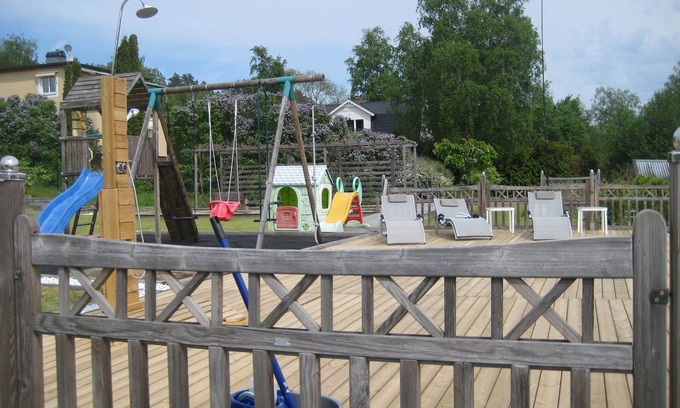 Kolmarden House | Rosa Villa with pool, jetty and playground 4 children