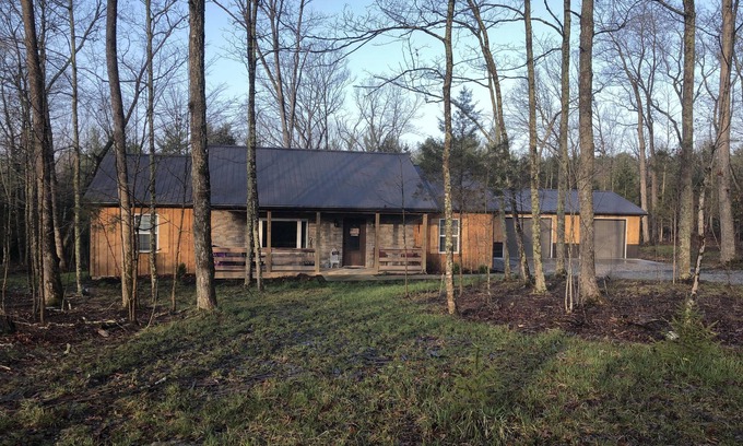 Winchester Cabin | Rustic Cabin with modern amenities and 1 acre stocked Fishing Lake !