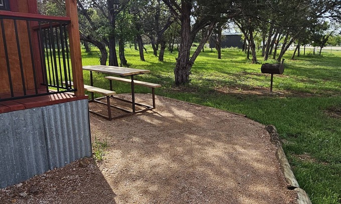 Silver Creek Village Cabin | Rustic one room cabin overlooks Lake Buchanan near Reveille Ranch and Spider Mtn