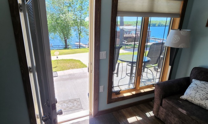 Solon Springs Apartment | Rustic Suite on the Lake: Cozy Comfort with Unmatched Sunrises.
