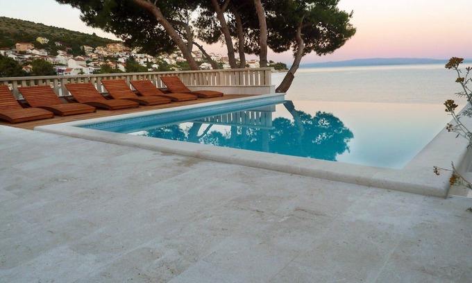 Businci Villa | Seafront villa with heated swimming pool, teak deck, open sea view, boat mooring