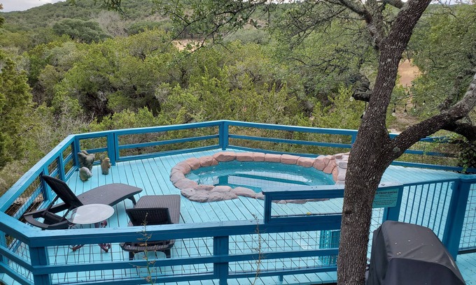 Wimberley House | Secluded gem nestled along Lone Man Creek with fireplace and long views