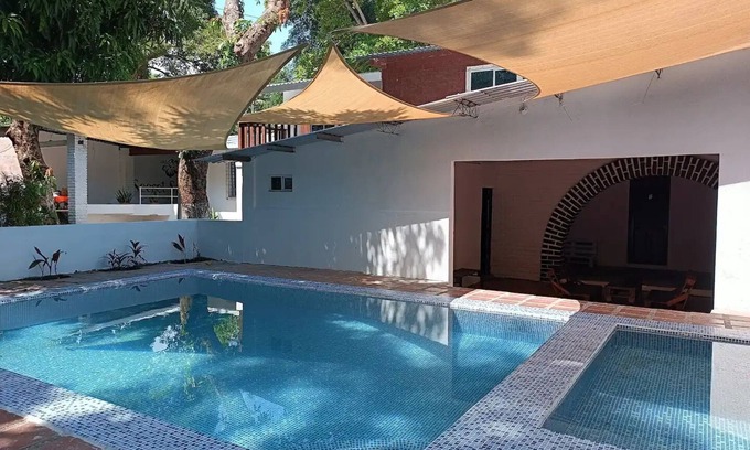 El Tunco Bed & Breakfast | Secret Spot Surf Inn - Quadruple room in Sunzal