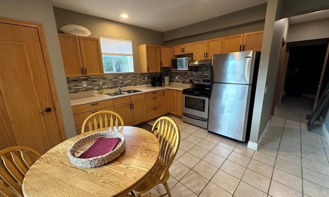Citadel Apartment | Separate sunny walk out basement suite in safe upscale neighborhood. Pets ok/fee